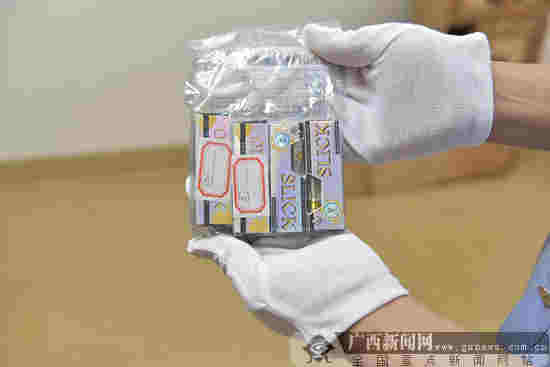 桂林市首例郵包走私大麻煙油案開庭審理